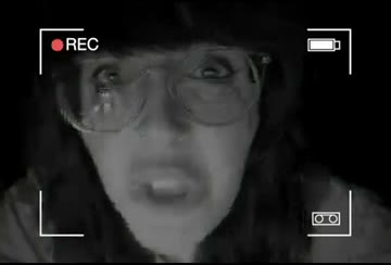 Courtnie looking off to the side of the camera, mouth open